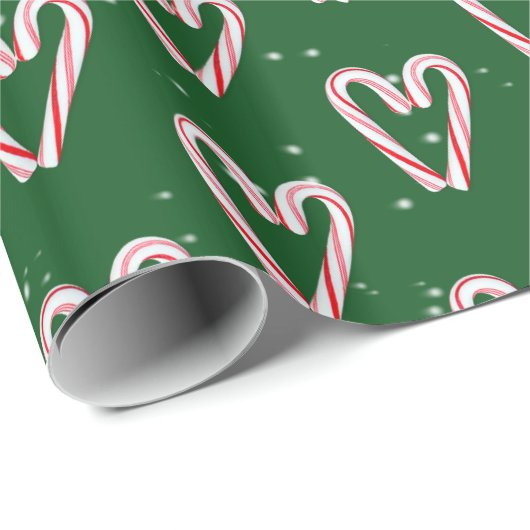 Kandijrietharten en sneeuwvlokken op groen cadeaupapier (Rol Hoek)