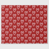 Kandijrietharten en sneeuwvlokken op rood cadeaupapier (Vlak)