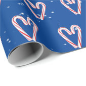 Kandriethoorns in sneeuwvlokken op blauw cadeaupapier (Rol Hoek)