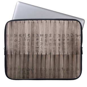 Kanji-tekst aan boord laptop sleeve