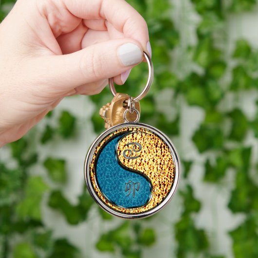 Kanker en vuur konijn sleutelhanger (Hand)