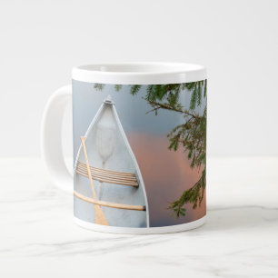 Kano op meer bij zonsondergang, Canada Grote Koffiekop