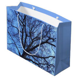 Kanopie tegen een blauwe winterhemel - large cadeautasje