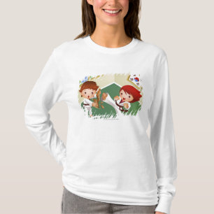 Karate jongen houdt hout vast met een ander brein t-shirt