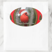 Kardinaal en Kerstbomen op Rode Achtergrond Ovale Sticker (Tas)