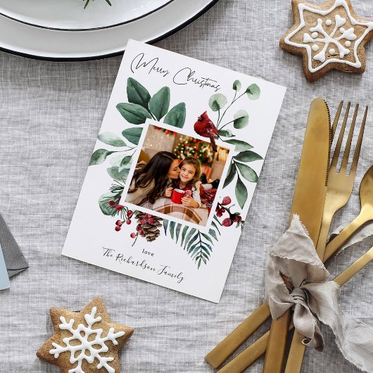 Kardinaal kerstkaartje voor vogels en sinaasappele