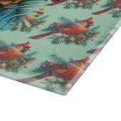 Kardinaal op dennentak met winterbessen snijplank (Hoek)