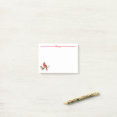 Kardinaal op een sparrentak post-it® notes (Op bureau)