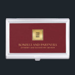 Kardinaal Red Leather Business Corporate Gold Logo Visitekaarthouder<br><div class="desc">Deze luxueuze visitekaartjes houder heeft een verfijnde kardinale rode lederen textuur, perfect gecombineerd met uw zakelijke logo over een nepgouden overlay voor een premium, professionele uitstraling. Jouw naam, beroep of vaste naam onderscheidt zich in weelderige goudkleurige letters, waardoor een tijdloze en onvergetelijke indruk ontstaat. Ideaal voor professionals in verschillende sectoren,...</div>
