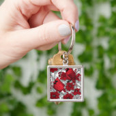 Kardinalen en poinsettia, rood en wit sleutelhanger (Hand)