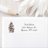 Kardinalen in een besneeuwde boom etiket (Insitu)