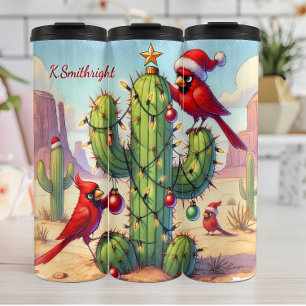Kardinalen versieren een cactus thermosbeker