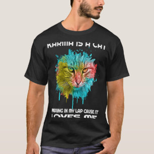 Karma is een kat die in mijn schoot spint omdat he t-shirt