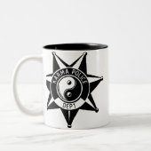 Karma politie. tweekleurige koffiemok (Links)