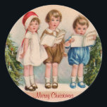 Karoling Kinder Merry Christmas Stickers<br><div class="desc">Het oorspronkelijke afbeelding is uit de jaren 1800,  waarin drie charmante kinderen kerstliederen zingen alsof ze in een kerstfeest show op school zitten. Creëer een geweldige vintage kerst sticker.</div>