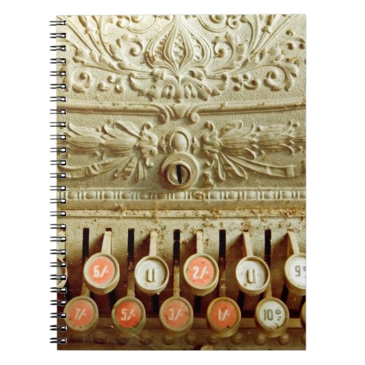 kassenregister, dat onder stof en cobweb valt notitieboek (Voorkant)