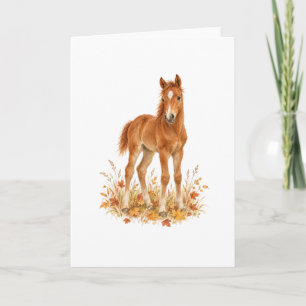 Kastanjebruin veulen in herfstweide kaart