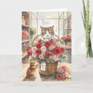 Kat arrangeert bloemrozen in mand voor Valentijnsd Kaart