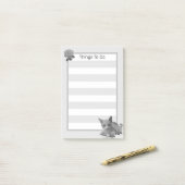 Kat en bloemen in grijze hades post-it® notes (Op bureau)