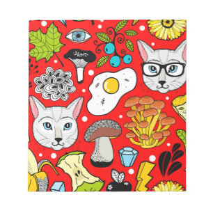 Kat en ei op rood notitieblok