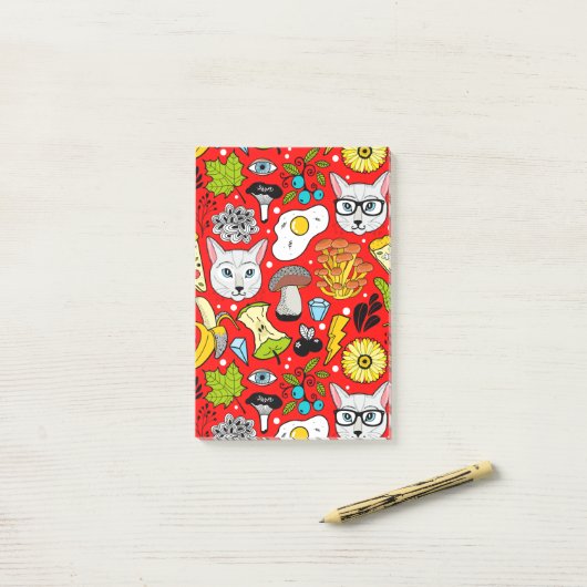 Kat en ei op rood post-it® notes (Op bureau)