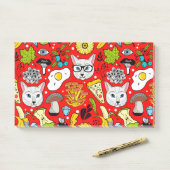 Kat en ei op rood post-it® notes (Op bureau)