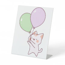 Kat houdt ballontekening vast