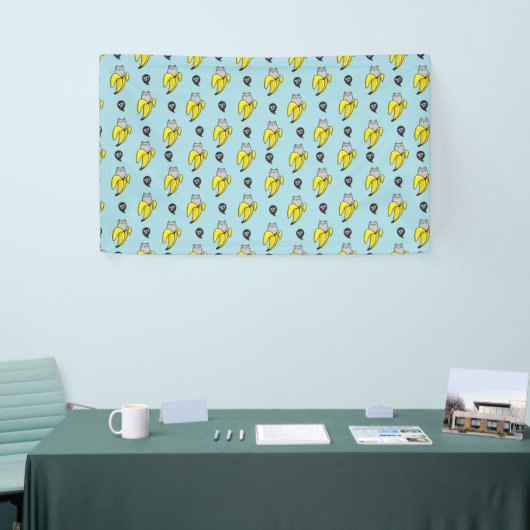 Kat in bananen spandoek (Beurs)