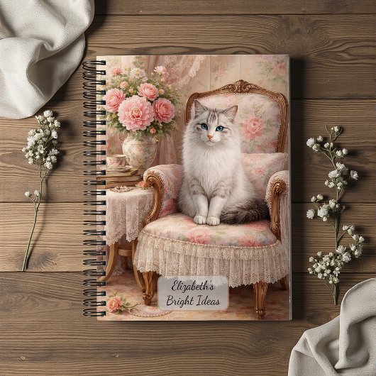 Kat in bloemstoel notitieboek