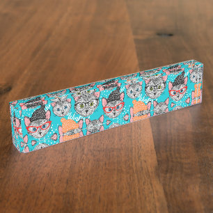 Kat in de pet naambordje