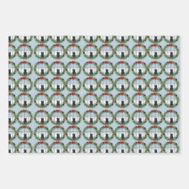 Kat in een kerstkrans inpakpapier vel