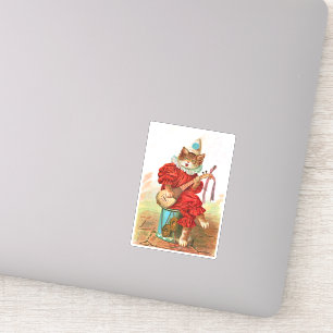 Kat in kleren aan trommelspellen sticker