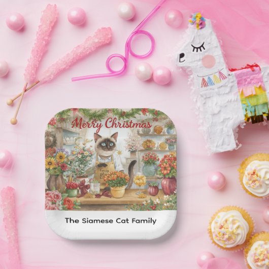 Kat Kerstbloem arrangement door bloemist Papieren Bordje (Feest)