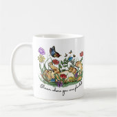 Kat kitten die tuinvlinderbloemen spelen koffiemok (Links)