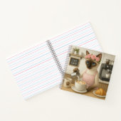 Kat maakt koffie in café notitieboek (Binnen)