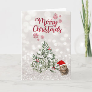 Kat met kerstmuts, takken bomen, glitterbokeh feestdagen kaart