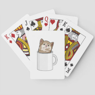 Kat met koffie-mok pokerkaarten