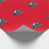 kat met mes cadeaupapier (Hoek)