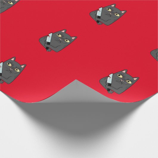 kat met mes cadeaupapier (Hoek)