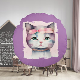 Kat met roze boog rond kussen
