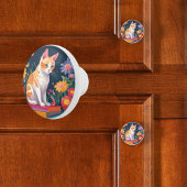 Kat op boeken keramische knop