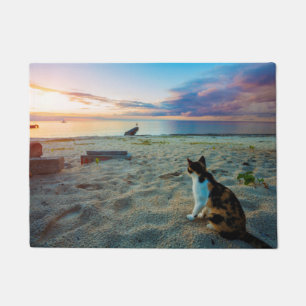 Kat op een strand deurmat