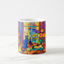 Kat op keukentafel bij raam