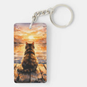 Kat op steiger bij zonsondergang sleutelhanger (achterkant)