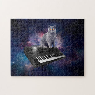 Kat op synthesizer in de ruimte legpuzzel