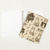 Kat Planner op een Vervaaide Piano (Display)