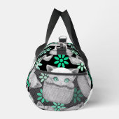 Kat Schattige en speels piekend uit een broekzak Plunjezak (Rechts)