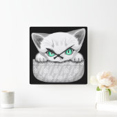 Kat Schattige en speels piekend uit een broekzak Vierkante Klok (Huis)