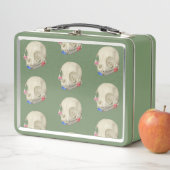 Kat schedel met flora (In situ)