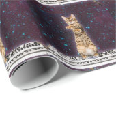 Kat-toetsenbord valt weer aan cadeaupapier (Rol Hoek)